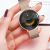 Smartwatch Slayo Grace SM43, zegarek trzymany w dłoni